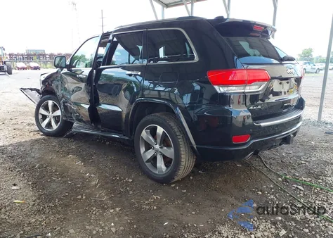 2014 Jeep Grand Cherokee Overland z USA, uszkodzony, nr VIN 1C4RJFCG4EC355890